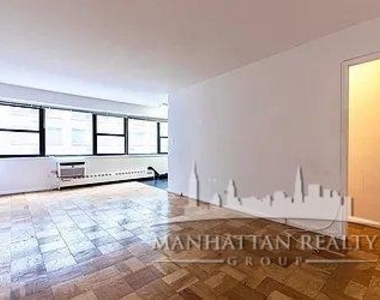 E 46th St - Photo Thumbnail 2