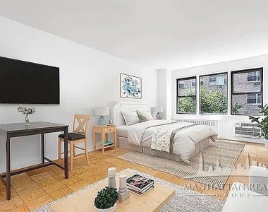 E 46th St - Photo Thumbnail 3