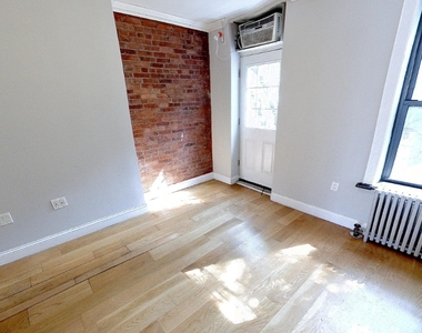 102 East 7th Street - Photo Thumbnail 4