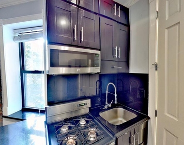 325 East 5th Street - Photo Thumbnail 1