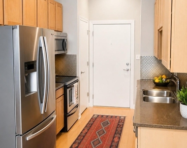 2931 E 12th St - Photo Thumbnail 3