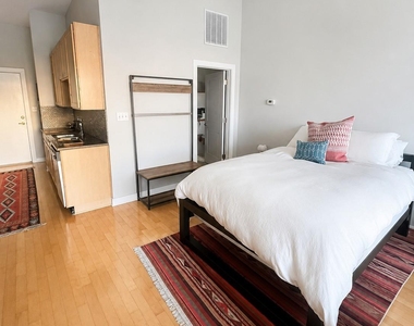 2931 E 12th St - Photo Thumbnail 4