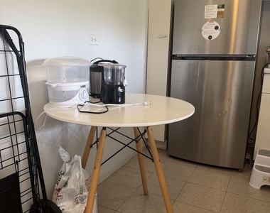 1401 E 55th Street - Photo Thumbnail 5