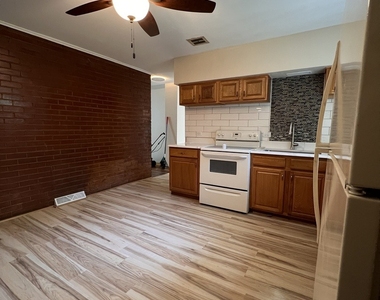 9594 S Colfax Avenue - Photo Thumbnail 5