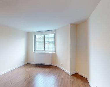 401 E 34th St - Photo Thumbnail 2