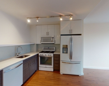 401 E 34th St - Photo Thumbnail 1