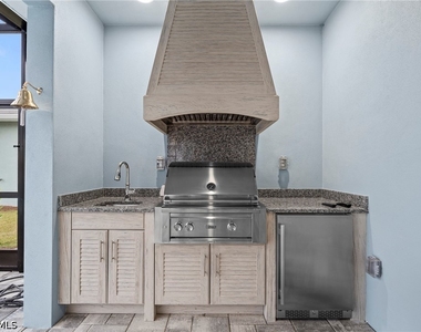 8795 Calypso Court - Photo Thumbnail 25