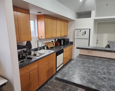 617 E 12th 1/2 Street - Photo Thumbnail 3