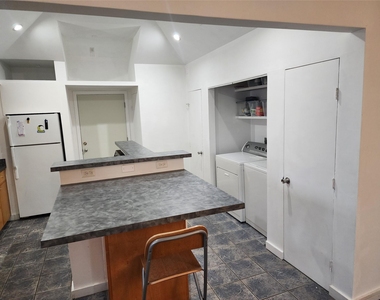 617 E 12th 1/2 Street - Photo Thumbnail 4