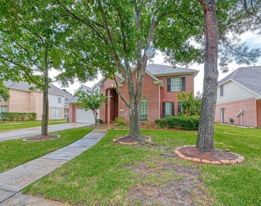 22011 Windmill Bluff Lane - Photo Thumbnail 1