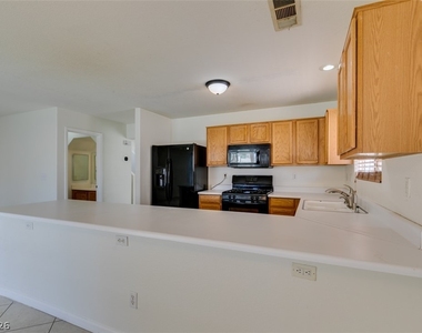 5025 Glittering Star Court - Photo Thumbnail 29