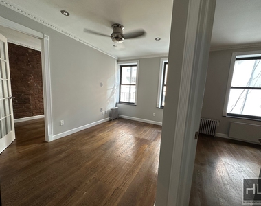 E 26th St. - Photo Thumbnail 2