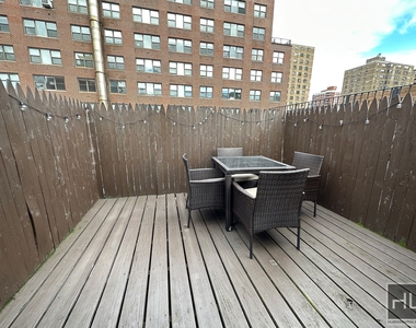 E 26th St. - Photo Thumbnail 6