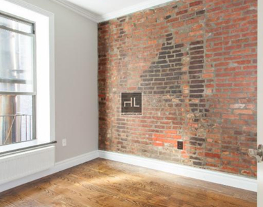 E 13th St. - Photo Thumbnail 4