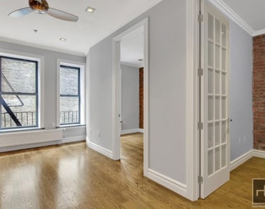 E 13th St. - Photo Thumbnail 2