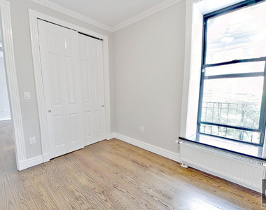 E 13th St. - Photo Thumbnail 7