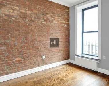 E 13th St. - Photo Thumbnail 9