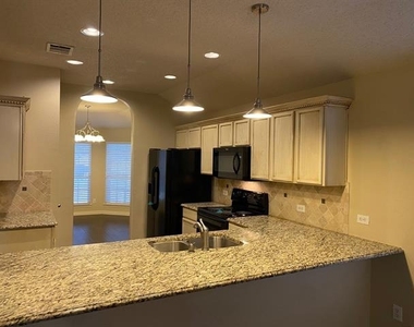 9909 Carter Drive - Photo Thumbnail 11