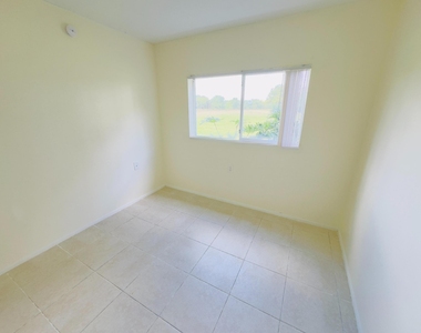 1101 N Benoist Farms Road - Photo Thumbnail 3