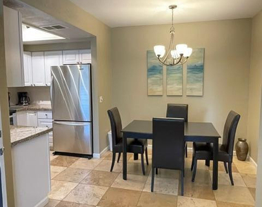 9450 E Becker Lane - Photo Thumbnail 5