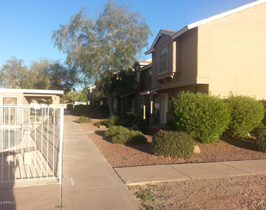 5813 N 59th Drive - Photo Thumbnail 1
