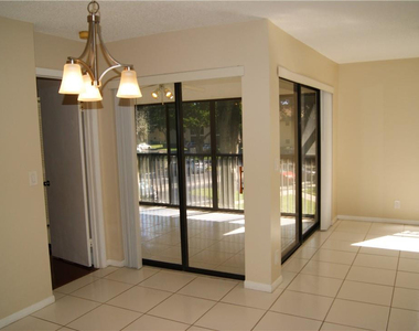 3781 Cocoplum Circle - Photo Thumbnail 3