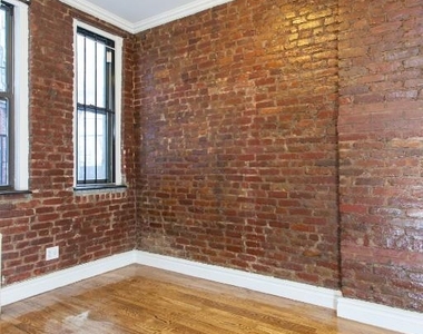 E 13th St. - Photo Thumbnail 3