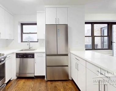 E 16th St - Photo Thumbnail 5