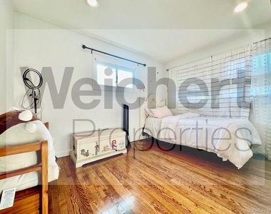 211 W 22nd - Photo Thumbnail 8