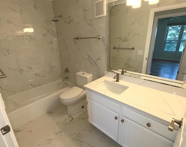 1521 Spring Gate Drive - Photo Thumbnail 9