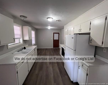 1021 W Rowan Street - Photo Thumbnail 2