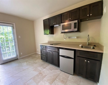 2402 Rio Grande St - Photo Thumbnail 2