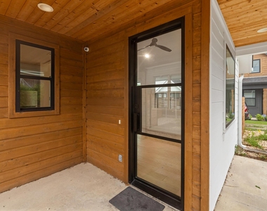7706 Watson St - Photo Thumbnail 2