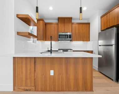 7706 Watson St - Photo Thumbnail 7
