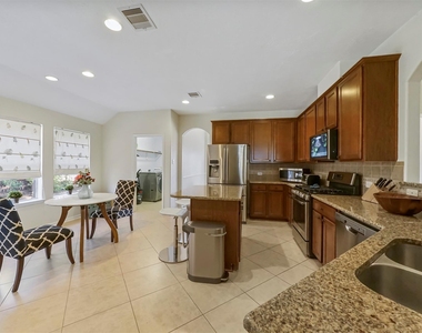 8214 Garrison Point Drive - Photo Thumbnail 8