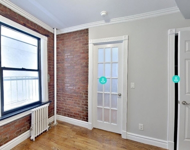 E 13th St. - Photo Thumbnail 1