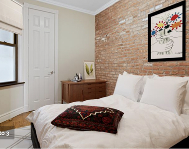 E 13th St. - Photo Thumbnail 2