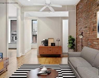 E 13th St. - Photo Thumbnail 3