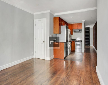 E 12th St. - Photo Thumbnail 2