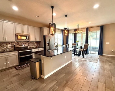 5608 Blowing Wind Place - Photo Thumbnail 1