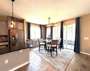 5608 Blowing Wind Place - Photo Thumbnail 2
