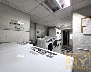 66-20 Wetherole St - Photo Thumbnail 12