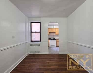 66-20 Wetherole St - Photo Thumbnail 2