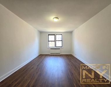 66-20 Wetherole St - Photo Thumbnail 4