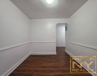 66-20 Wetherole St - Photo Thumbnail 3
