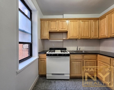66-20 Wetherole St - Photo Thumbnail 1
