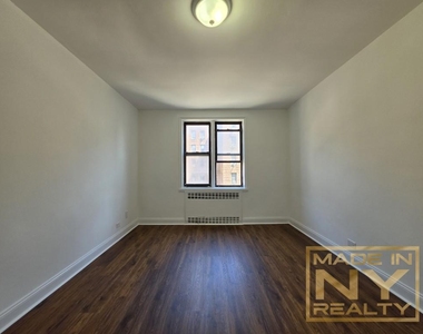 66-20 Wetherole St - Photo Thumbnail 7