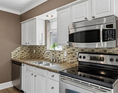7730 Meadow Road - Photo Thumbnail 3