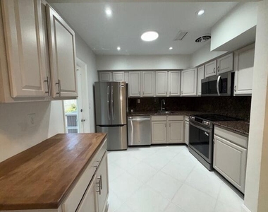 1575 Ne 47th Street - Photo Thumbnail 1