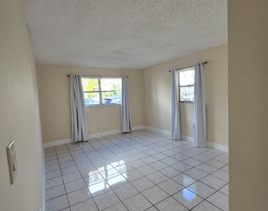 11604 Nw 29th Court Nw - Photo Thumbnail 1